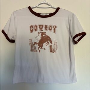 Brand is Burch and stone. Size L. White and brown.